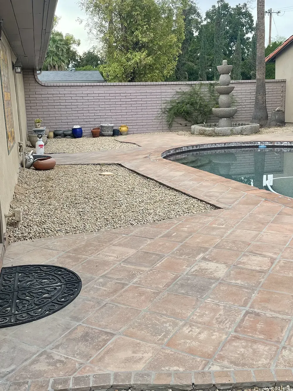 Before Image of pavers and pool