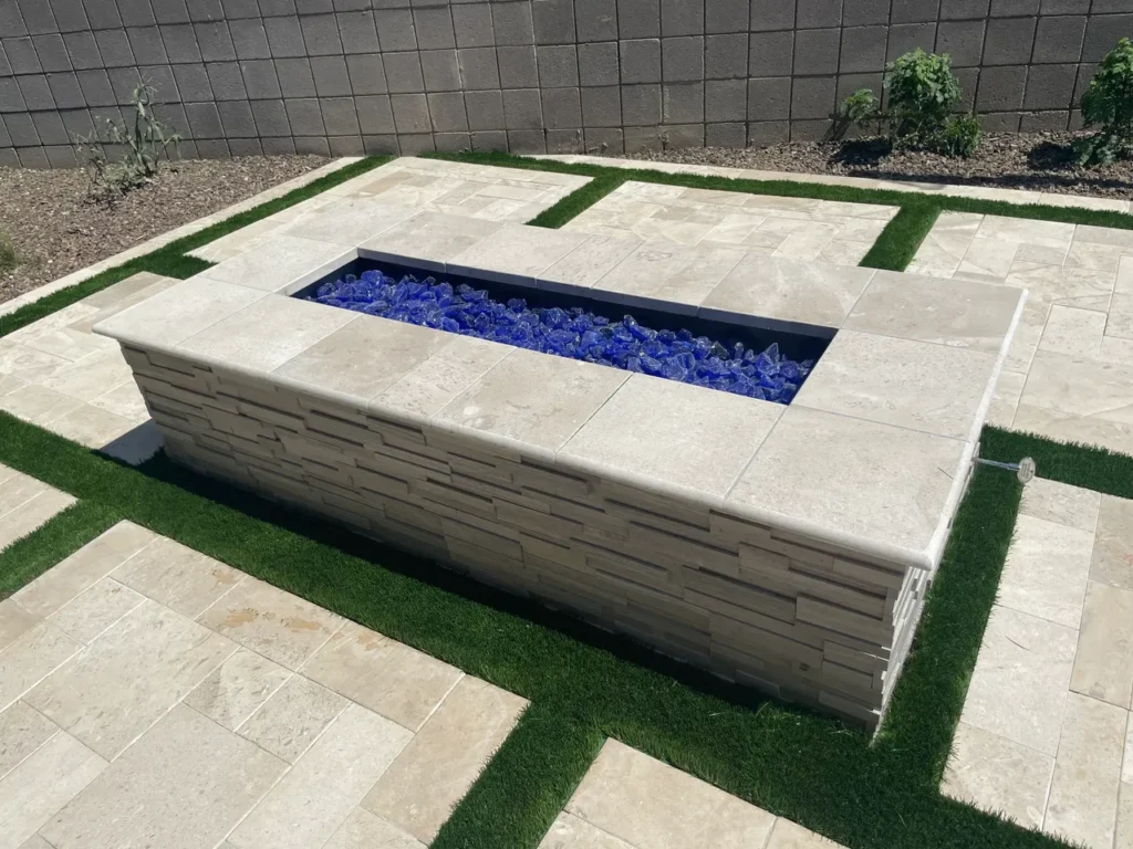 Firepit with blue stones.