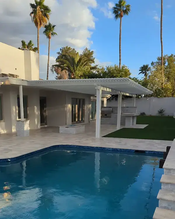 white pergola by pool