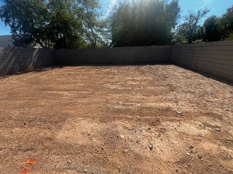 Before photo of backyard installation of artificial turf by Colorworks Landscaping