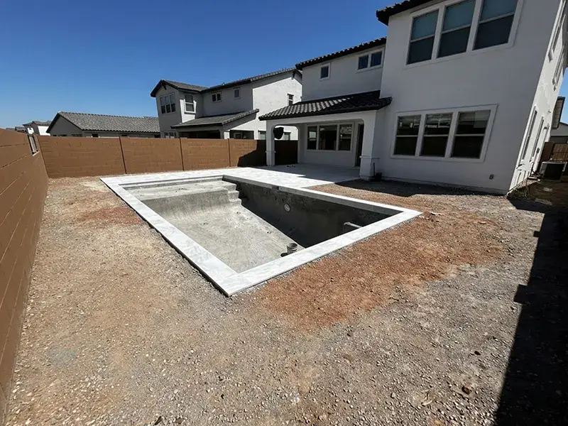 before photo of Artificial turf landscaping done by pool
