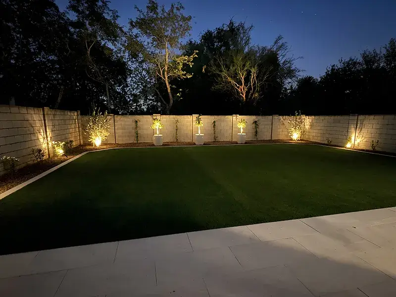 Outdoor lighting around perimeter of backyard
